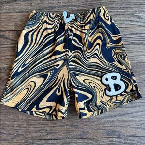 BKTSQD: Swirl Print Athletic Shorts with 'B' Patch - Black & Orange